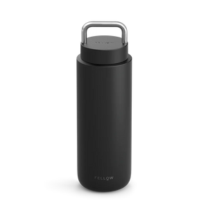 Matte black insulated travel mug with practical handle for trips, part of Take away, Fellow, Latest news, all about coffee.