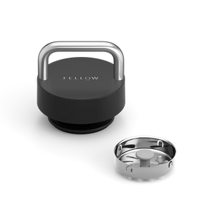 Black lid with stainless steel holder and removable flow screen, part of EspressoGear, Fellow, Latest news, all about coffee.