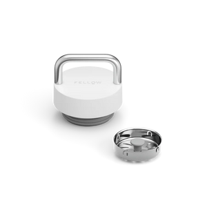 White lid with stainless steel handle and removable flow screen for thermos, part of Fellow and EspressoGear, Latest news, all about coffee.