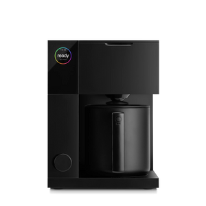 Black coffee maker with digital display and carafe, part of Fellow, Coffee Maker, Latest news, all about coffee.