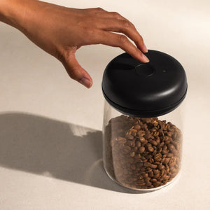 Glass jar with black electric vacuum lock for coffee beans, part of EspressoGear, Fellow, Storage, all about coffee
