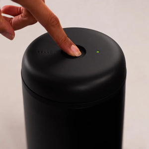 Black electric vacuum container for coffee storage with button and LED indicator, part of Fellow, EspressoGear, Storage, Latest news, all about coffee.