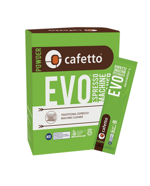 Green package with cleaning powder for professional espresso machine, part of cleaning agents and maintenance accessories.