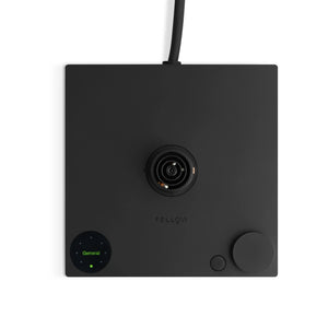 Black base unit for electric kettle with control button and digital display, part of EspressoGear, all about coffee.