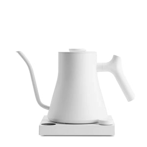 White electric kettle with narrow gooseneck and digital temperature control, part of Fellow, EspressoGear, all about coffee