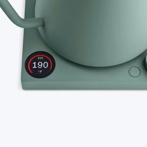 Green electric kettle with digital temperature display and button, part of Fellow, EspressoGear, Kettles, all about coffee