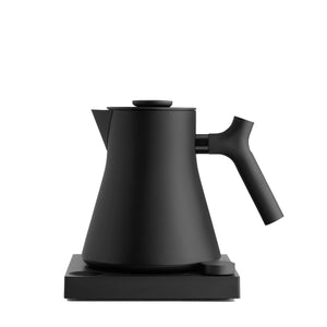 Matte black kettle with balanced shape and precision for brewing, part of Fellow, brewing accessories, all about coffee