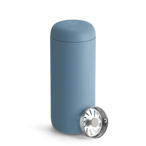 Reusable travel mug in mist blue shade with removable lid, part of Fellow, Take away, all about coffee.