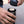 Close-up of hand inserting capsule adapter into Portable coffee maker, barista and espresso category.