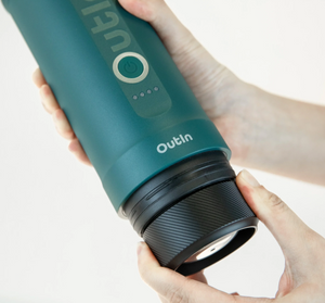 Handheld Portable espresso maker in turquoise with adjustable capsule section, from the category Portable coffee makers.