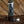 Black portable Nanopresso with coffee capsules and ground coffee, espresso accessories from Barista, and portable coffee makers.
