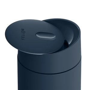 Insulated to-go mug in stone blue with smooth slide opening, part of Fellow, Take away, EspressoGear, all about coffee.