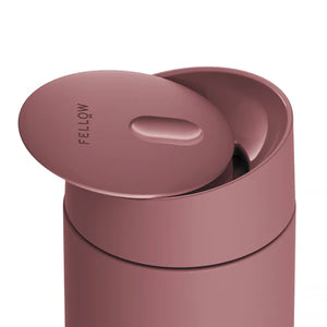 Reusable pink travel mug with sliding lid in modern design, part of Fellow, Take away, EspressoGear, all about coffee.